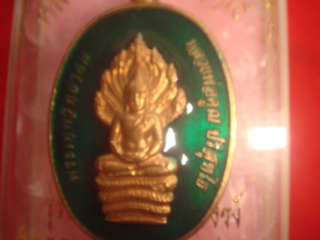 พระนาคปรกรุ่นสร้างกุฎิสงฆ์วัดราษฎร์บำรุง (วัดปรก)ออกปี 53 เนื้อนวะลงยาสีเขียว หมายเลข 31 สภาพสวย