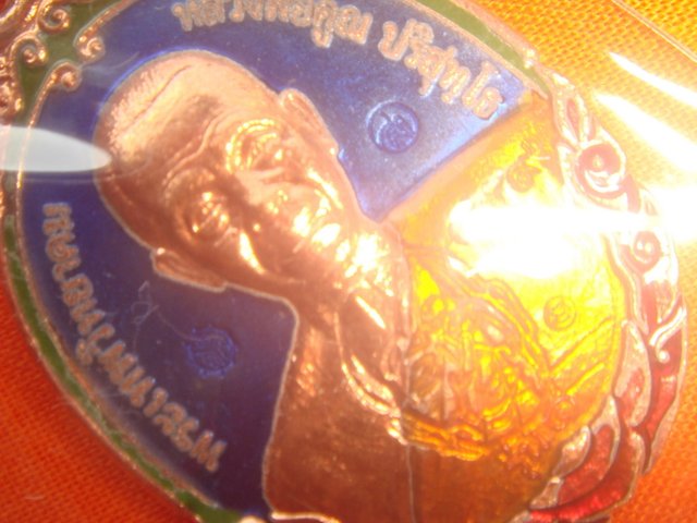 เหรียญหลวงพ่อคูณ รุ่นกายเทพรุ่้น.1 ออกวัดตะครองงามปี56 เนื้อทองแดงลงยาสีน้ำเงิน หมายเลข.459 สภาพสวย