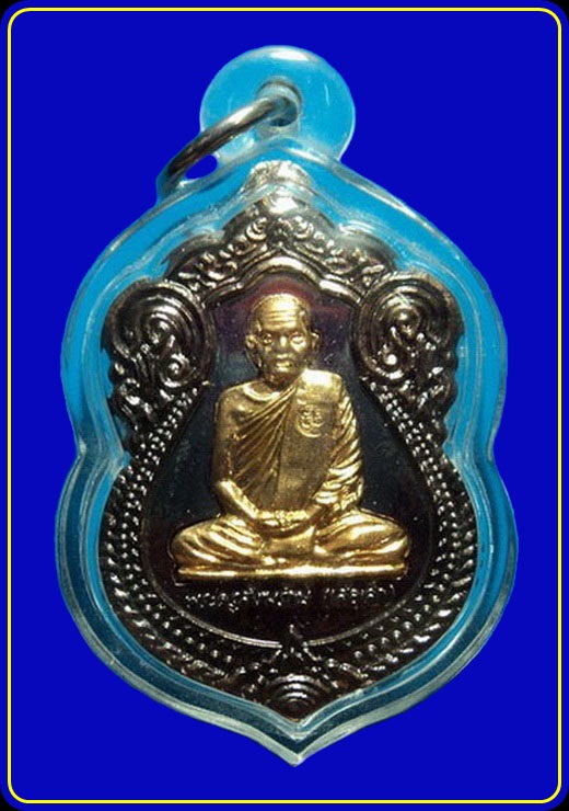 เหรียญรุ่นอายุวัฒนะมงคล 99 พ่อท่านเสือเล็ก วัดควนซาง ตรัง เนื้อรมดำองค์ทอง