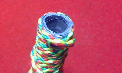 ตะกรุด ถักด้ายเจ็ดสี่ เนื้อตะกั่ว ลป.หมุน