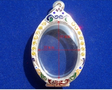 ตรับพระเงินแท้ ลงยา ล้อมพลอย มือหนึ่ง