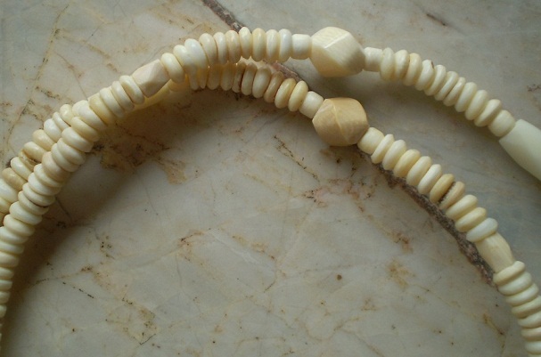 สร้อยงาช้างล้วน   ห่วงกลางโค้ง  เคาะเดียว  