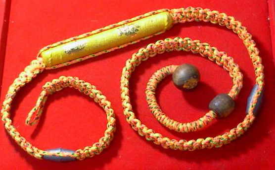ตะกรุดท่าทอง ดอกใหญ่ ถักด้ายเจ็ดสี่คาดเอว ลป.หมุน