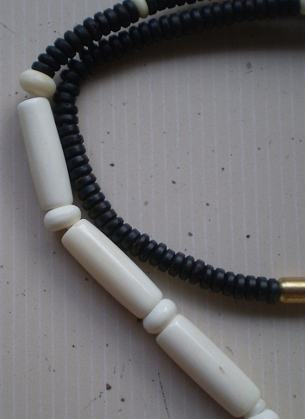 สร้อยกะลาตาเดียว  บวกกระดูกช้าง  ห่วงกลางหัวช้างเคาะเดียว 