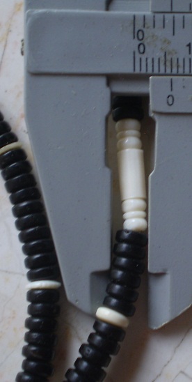 สร้อยกะลาตาเดียว  บวกงาช้างแท้  ห่วงกลางหัวขุน เคาะเดียว 