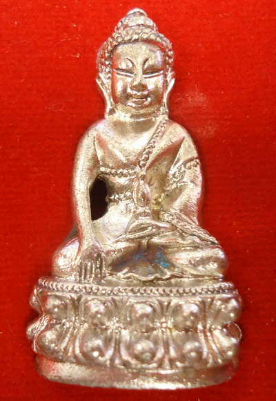 พระกริ่งธรรมสิงห์บูรพาจารย์ หลวงพ่อจรัญ วัดอัมพวัน เนื้อนวะโละแก่เงิน หมายเลข๑๗๑๓