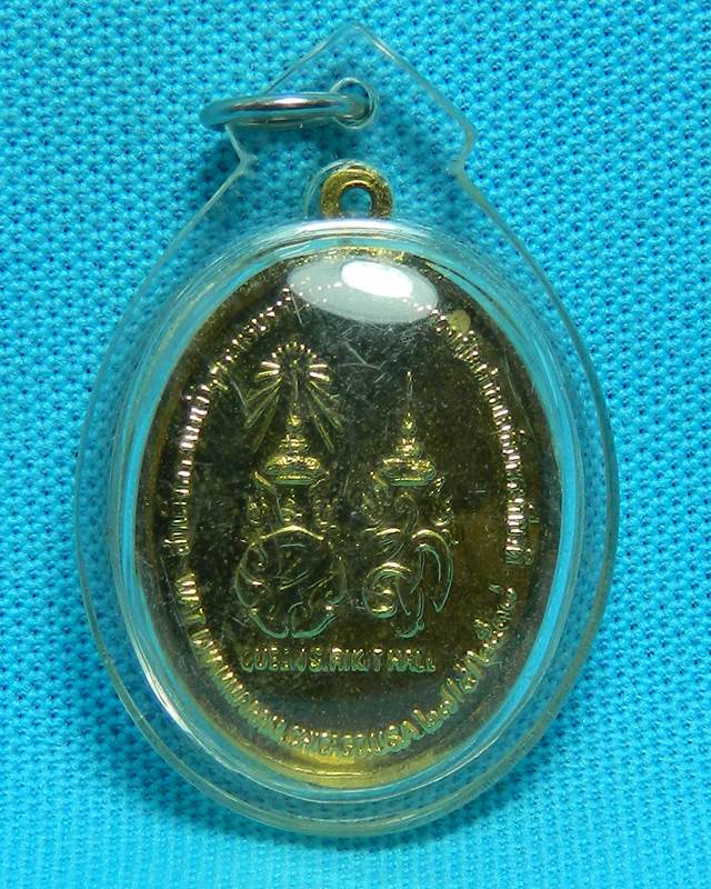 เหรียญพระพุทธชินธัมโนภาส หลัง ภปร. และ สก. ที่ระลึกเสด็จเปิดศาลาเฉลิมพระเกียรติที่ นครชิคาโก