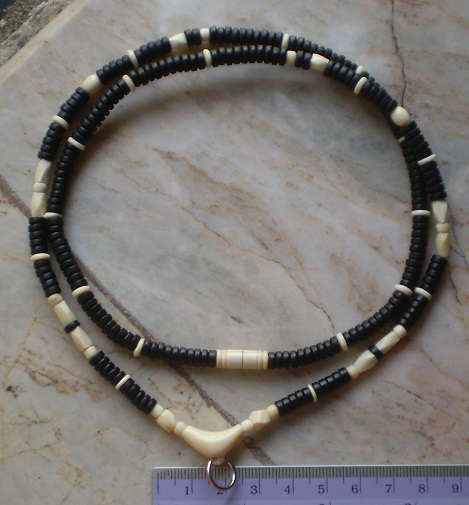 สร้อยกะลาตาเดียว บวกงาช้างแท้  ห่วงกลางทรงกระจับ  เคาะเดียว 