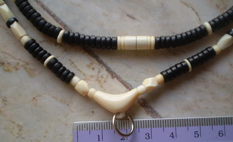 สร้อยกะลาตาเดียว บวกงาช้างแท้  ห่วงกลางทรงกระจับ  เคาะเดียว 