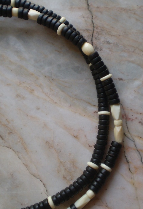 สร้อยกะลาตาเดียว บวกงาช้างแท้  ห่วงกลางทรงกระจับ  เคาะเดียว 