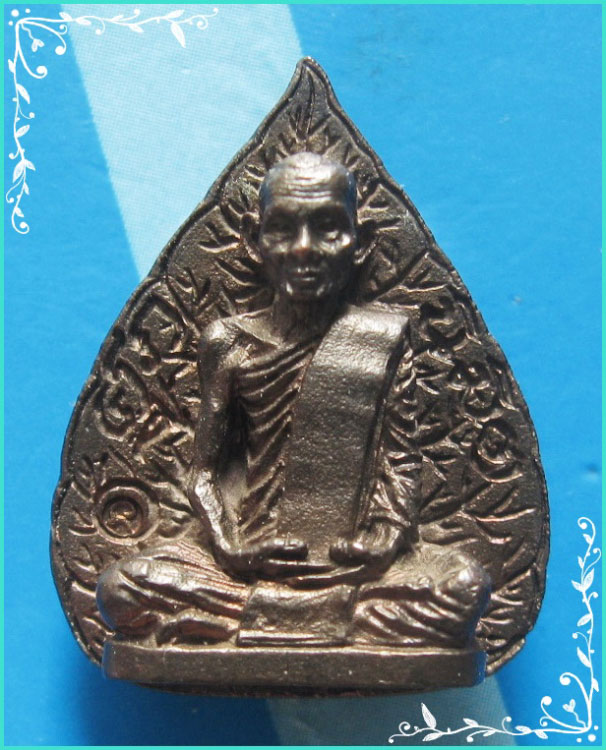 ...ลป.คำพันธ์ วัดธาตุมหาชัย เหรียญหล่อรูปใบโพธิ์ เนื้อนวโลหะแก่ทอง หลังยันต์ รุ่นศุภนิมิต ปี 35...