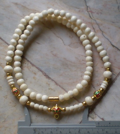 สร้อยกระดูกช้าง สลับทองไมครอน   ห่วงกลางหัวขุน  เคาะเดียว 