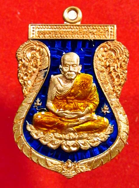 วัดใจ หลวงปู่ทวด เนื้อทองแดงลงยาน้ำเงินจีวรเหลือง รุ่นฉลอง 7 รอบ พ่อท่านเขียว วัดห้วยเงาะ เลข 181
