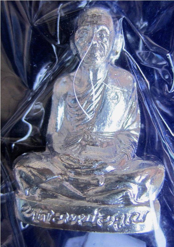 หลวงพ่อคูณ รุ่นปาฏิหาริย์ EOD รูปเหมือนปั๊ม เนื้อกะหลั่ยเงิน หมายเลข 1720