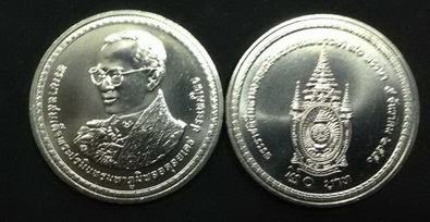 เหรียญในหลวงทรงผนวช ปี2550 จำนวน 2 เหรียญ แถมเหรียญในหลวงปี 2550 ราคา 20 บาท จำนวน 2 เหรียญ