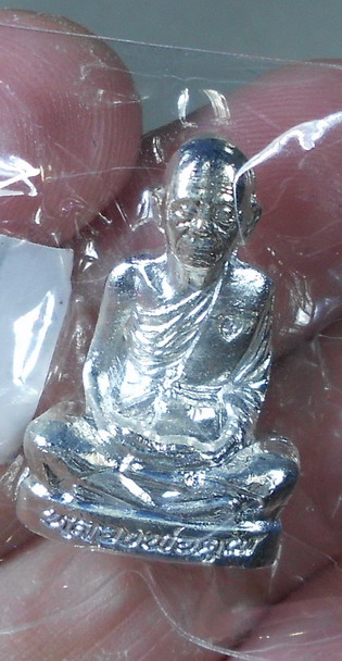 รูปเหมือนปั๊มหลวงพ่อคูณ รุ่นปาฏิหาริย์ EOD กะหลั่ยเงิน ปี 2557