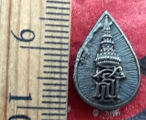 Oh 494 เหรียญพระพุทธ ว.ร.ป. ...แดง 10 บาท