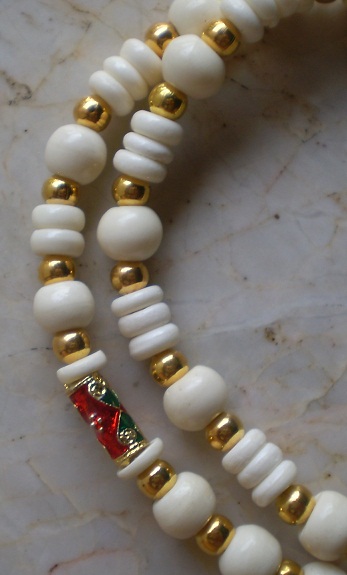 สร้อยกระดูกช้าง สลับทองไมครอน  ห่วงกลางหัวขุน  เคาะเดียว 