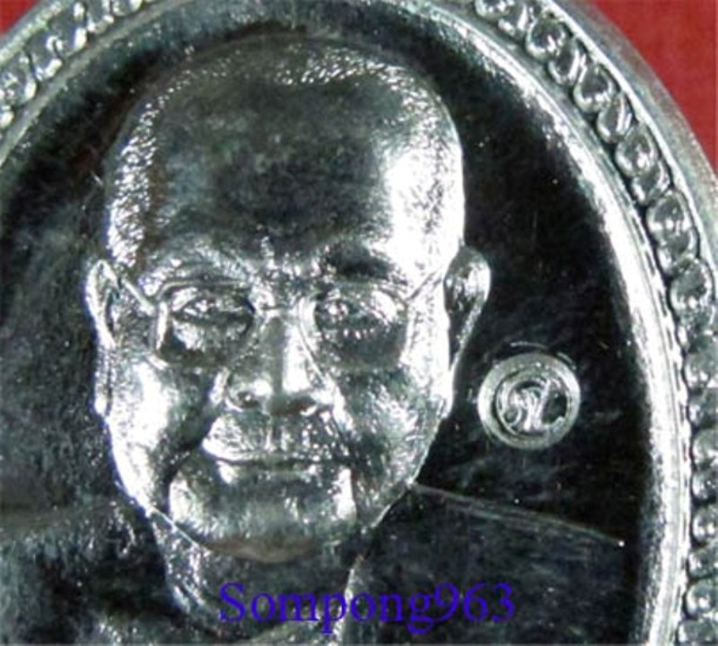 เหรียญหลวงพ่อจรัญ วัดอัมพวัน จ.สิงห์บุรี ปี 2554 ตอกโค๊ต