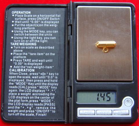 แคปซูลเกลียวปิดทอง 90% (มีห่วง) ยาว 13.5 มิล อ้วน 4.5 มิล นน. 1.45 กรัม *** Size เล็ก ***