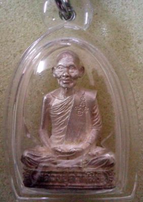 รูปหล่อรุ่นอุดมมงคล หลวงปู่คำพันธ์ วัดธาตุมหาชัย จ.นครพนม ปี 36 เนื้อเงิน
