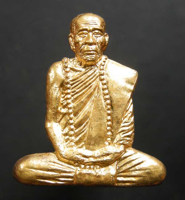 รูปเหมือนปั๊มครึ่งซีก "รุ่นแรก" ปี๒๕๕๑ หลวงปู่คำบุ วัดกุดชมภู 