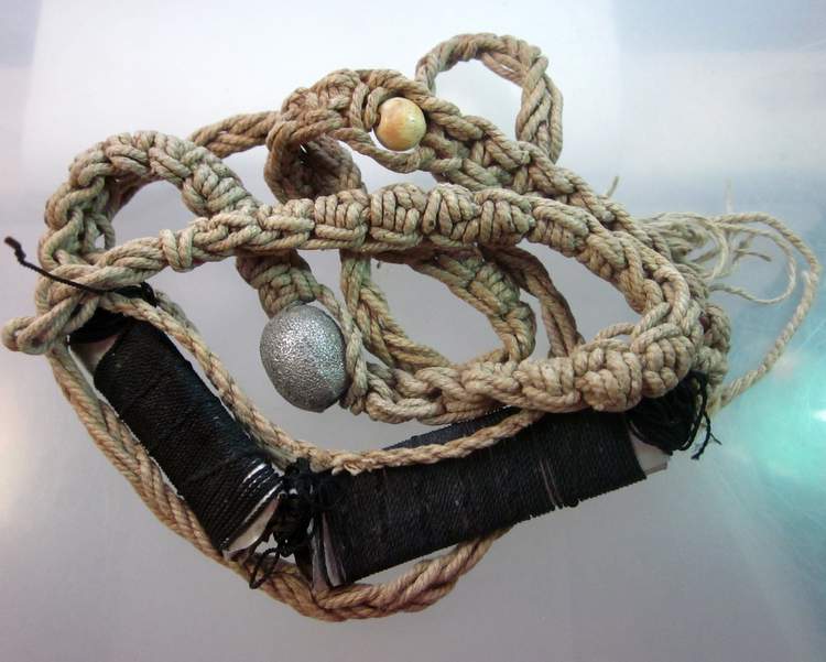 เชือกคาดเอว +ตะกรุด 2 ชั้น+ลูกสะกด เก่าพอสมควร