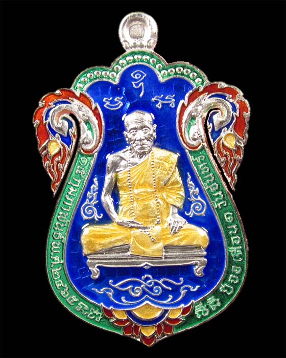 เหรียญเสมาฉลุ เนื้อเงินลงยา หลวงปู่คำบุ รุ่นเพชรกลับทรัพย์ทวีหมายเลข ๖๒