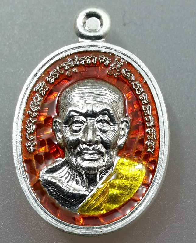 เหรียญเม็ดแตง ปาฏิหาริย์ หลวงพ่อทวด ต้นเลียบ เนื้อเงินลงยาแดง No.152