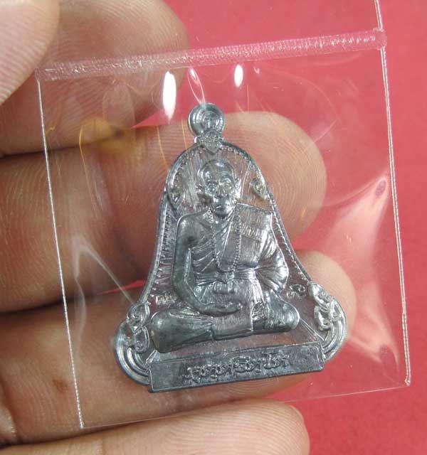 เหรียญตะกั่วมีจารเพชรกลับหลวงปู่คำบุ คุตฺตจิตฺโต วัดกุดชมภู อ.พิบูลฯ จ.อุบลราชธานีแชมป์สายอิสาน
