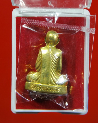 รูปเหมือนปั๊มรุ่นแรก เนื้อทองสตางค์ ครูบาเลิศ วัดทุ่งม่านใต้ จ.ลำปาง 