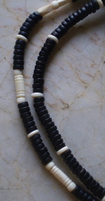 สร้อยกะลาตาเดียว  บวกงาช้างแท้   ห่วงกลางทรงกระจับ  เคาะเดียว 