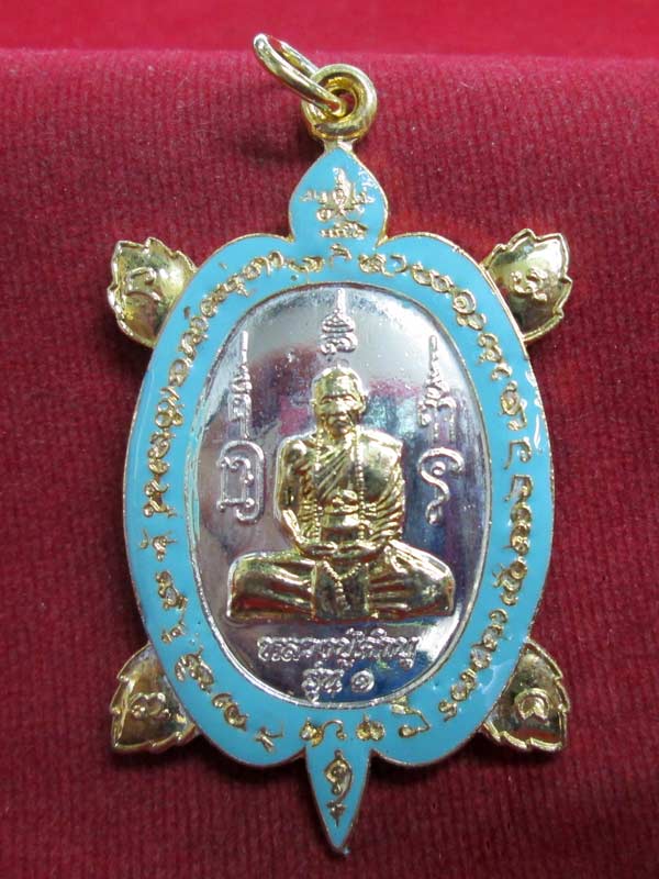 เหรียญเต่ารุ่นแรก หลวงปู่คำบุ เนื้อกะไหล่ลงยาสีเขียว