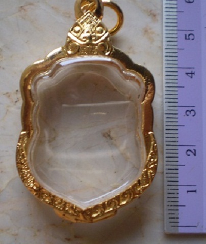 ตลับเงินขัดเงา  ปิดหลัง  ชุบทองแท้ ใส่เหรียญแปดรอบ  ลป  ทิม  เคาะเดียว 