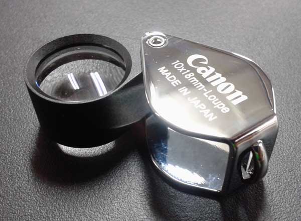 ( เคาะเดียว 10 บาท ) กล้อง Canon 10X18mm.-Louqe Full HD Made in Japan สวยกริ๊บบบ