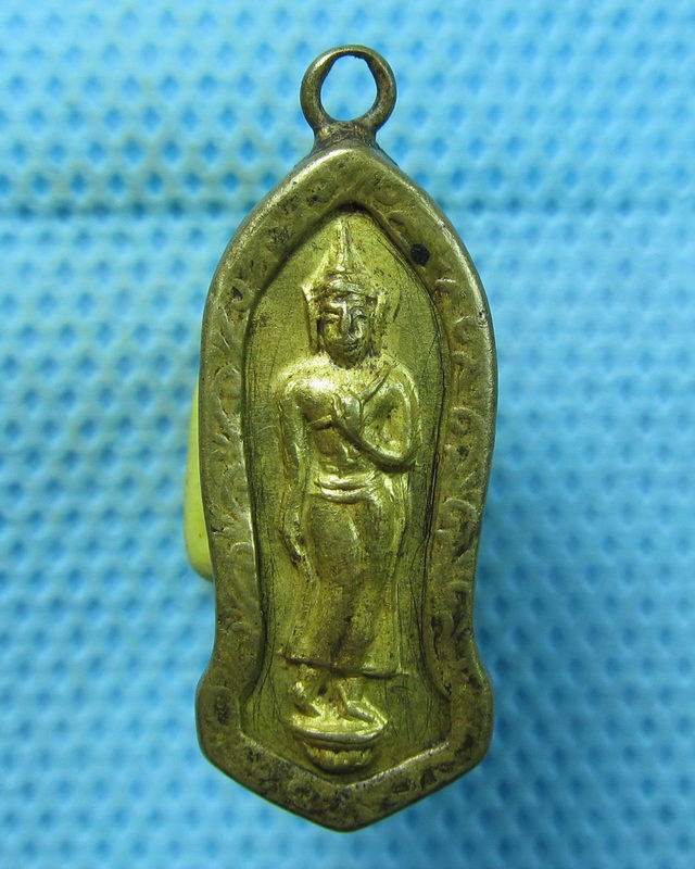 เหรียญพระแท่นดงรัง หลังนางกวัก  พร้อมเลี่ยมเก่าเดิม...เริ่ม20บาท(23/08/57-57)
