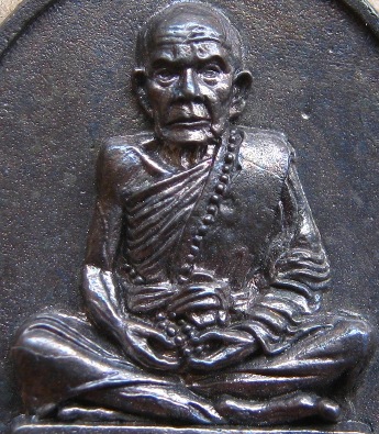 เหรียญหล่อเหล็กนำ้พี้ หลวงปู่หมุน ร.ศ. 232 รุ่น119 ปี