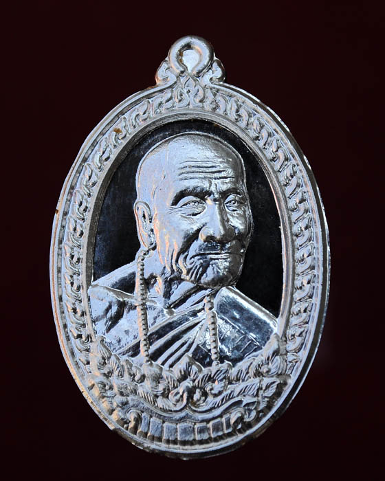 เหรียญเศรษฐีอุบล หลวงปู่คำบุ วัดกุดชมภู นวะหน้ากากเงิน 