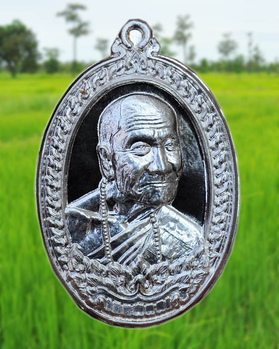 เหรียญเศรษฐีอุบล หลวงปู่คำบุ วัดกุดชมภู นวะหน้ากากเงิน 