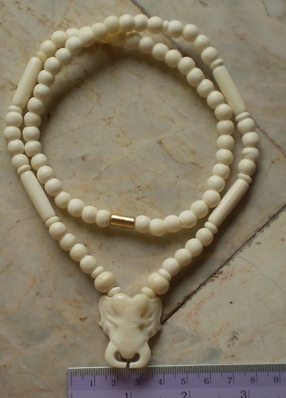 สร้อยกระดูกช้างล้วน  ห่วงกลางหัวช้าง เคาะเดียว 