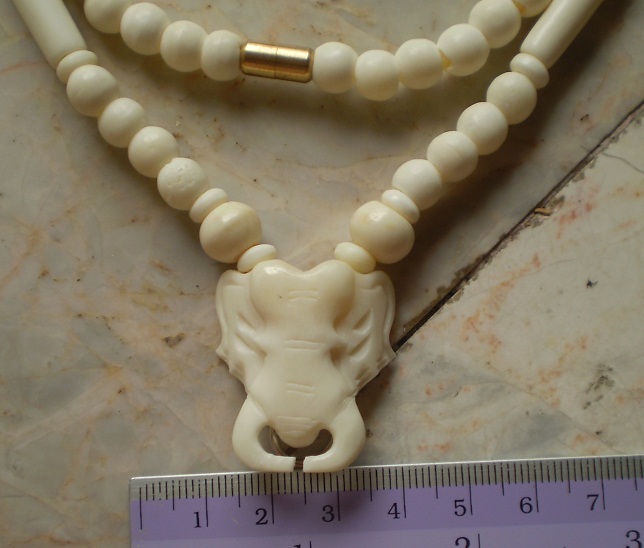 สร้อยกระดูกช้างล้วน  ห่วงกลางหัวช้าง เคาะเดียว 