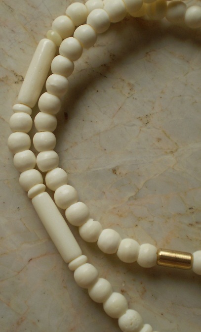 สร้อยกระดูกช้างล้วน  ห่วงกลางหัวช้าง เคาะเดียว 