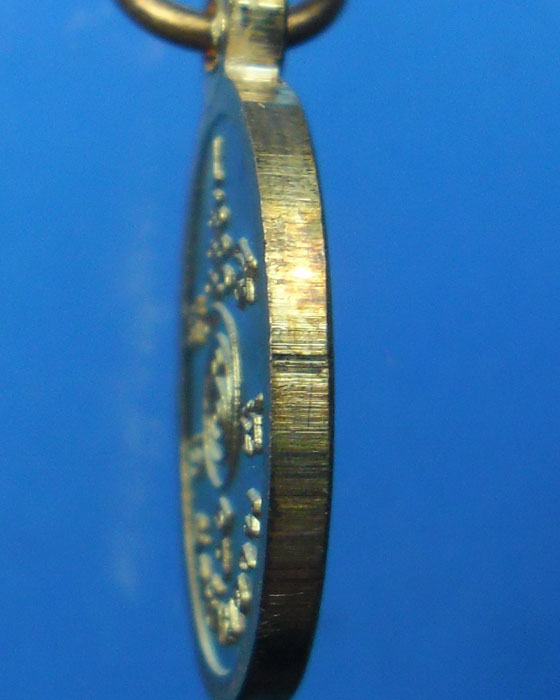 เหรียญเม็ดแตง หลวงปู่หมุน ฐิตสีโล วัดบ้านจาน รุ่นพระดีศรีสะเกษ เนื้อทองแดง ตอกโค๊ต  ปี ๒๕๕๖(๑)
