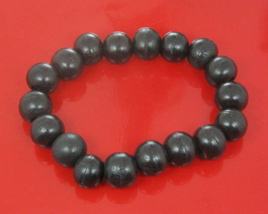 ประคำข้อมือไม้ยอ หลวงปู่เกลี้ยง เตชธมโม วัตถุมงคลชุดถมที่ดินวัด