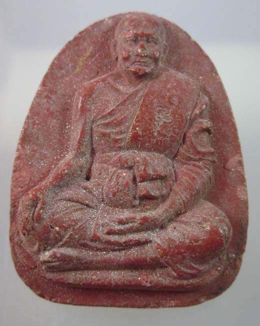 องค์พ่อจตุคามรามเทพ หลังรูปเหมือนเกจิ