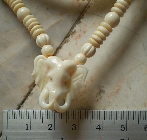 สร้อยงาช้างแท้  ล้วนๆ  ทุกแว่น  ห่วงกลางหัวช้าง  เคาะเดียว 