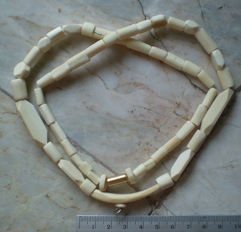 สร้อยงาช้างแท้  งาดิบ  ไม่มีการขัดเงา  ห่วงกลางโค้ง  เคาะเดียว 