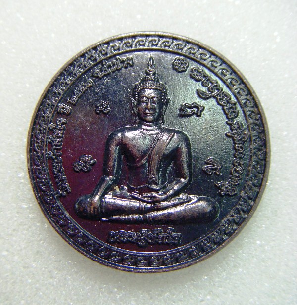 เหรียญเศรษฐีทันใจเนื้อทองแดงพิมพ์ใหญ่ วัดพระเจ้าทันใจ จ.ลำปาง หลังหลวงพ่อเกษม เขมโกปี ๒๕๕๑