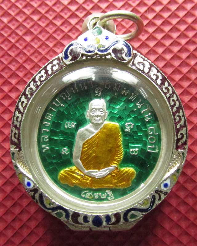 เหรียญกลมเศรษฐีเนื้อเงินลงยาเขียวหลวงปู่บุญหนา ธมุมทินุโน หมายเลข 79 ตลับเงินลงยา 
