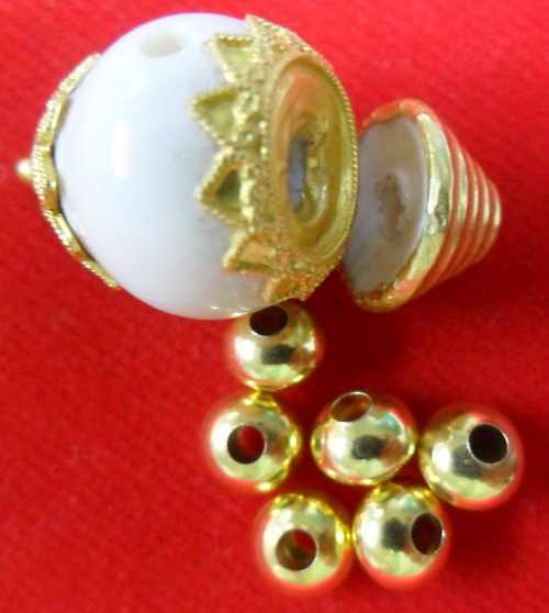 หัวขุนงาช้างแท้หุ้มทองสวยๆพร้อมเม็ดทองคำแท้ๆ 